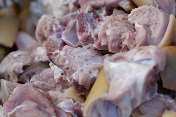 Goat meat is cut into pieces.