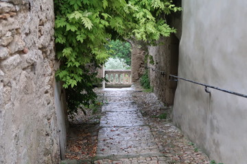 Fototapeta premium Street of the village of Grignan, France