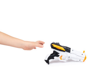 Naklejka premium Futuristic toy gun with kid hand, isolated on white background. copy space template