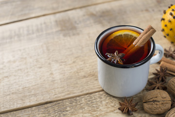 Traditional mulled wine in mug with spice