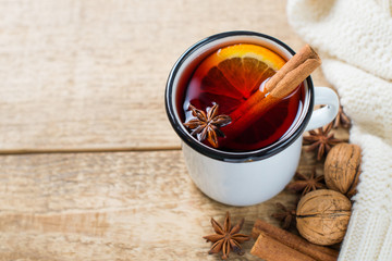 Traditional mulled wine in mug with spice