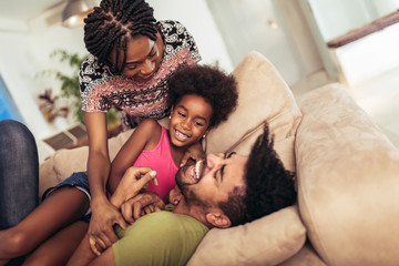 African american family spending time together at home. They are having fun