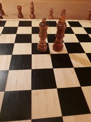 How to play wooden board game chess. Improvisation and Different angles of chess sets, pieces and chessboard. White and black figures and board of chess game. 