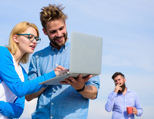 Fresh air helps to refresh mind. Colleagues laptop work outdoor sunny day, sky background. Deadline...