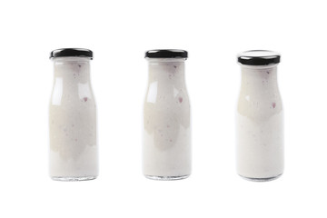 White sauce in a bottle isolated