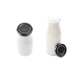 White sauce in a bottle isolated