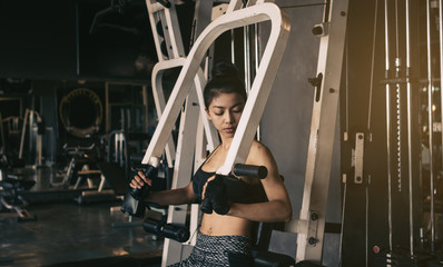 Fototapeta na wymiar Sporty woman exercise gym club.