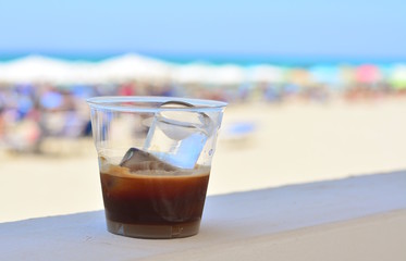 Black ice coffee on the beach - 214576183