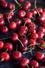 juicy sweet cherry on a black background