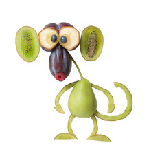 Funny monkey made with plum, pear and kiwi