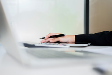 Administrator business man financial inspector and secretary making report calculating balance. Internal Revenue Service checking document. Audit concept