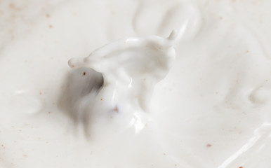 Obraz na płótnie Canvas Chocolate falls in milk