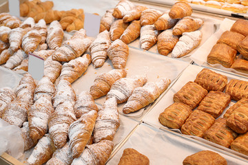 Fresh puff pastry on display in bakery