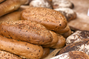Tasty fresh bakery with sesame seeds in shop