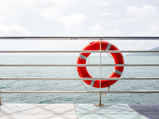 Red life ring on the ferry.