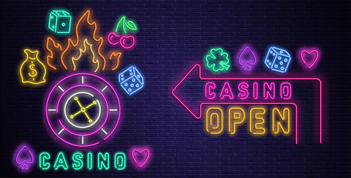 Neon luminous casino and open signs on purple bricklaying wall.