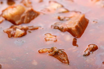 Beef stew in a pot close-up