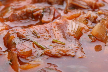Beef stew in a pot close-up