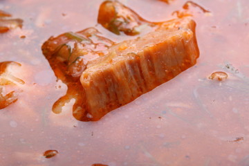 Beef stew in a pot close-up