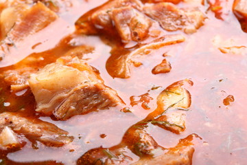 Beef stew in a pot close-up