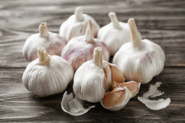 Fresh garlic on wooden background