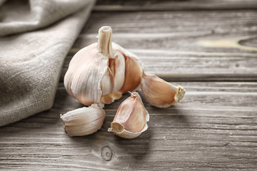 Fresh garlic on wooden background