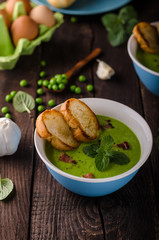 Pea soup, fresh herbs and bacon
