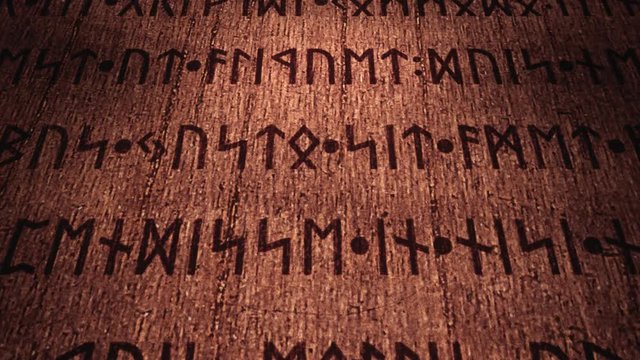 An ancient wooden tablet filled with carved runic signs, 3d panning from top-left to bottom-right. The text is fake, as it's the latin (public domain) Lorem Ipsum.
