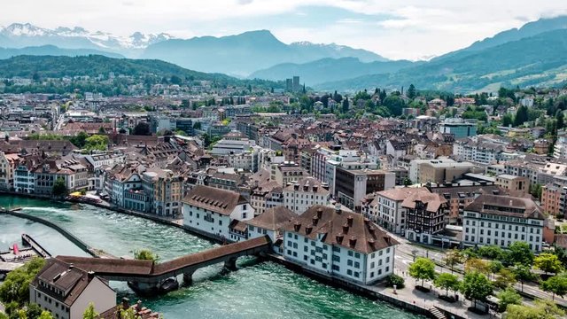 Swiss town Luzern with the Alps in the background timelapse 4K
