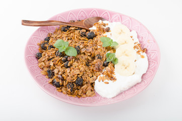 Granola baked in oven with nuts