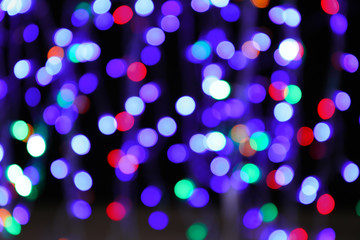 Christmas glowing lights, blurred view