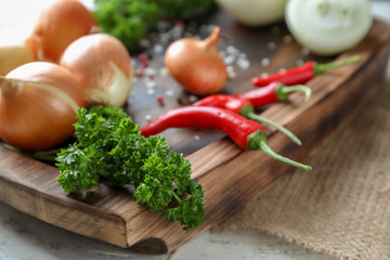Wooden tray with fresh spices on table, closeup