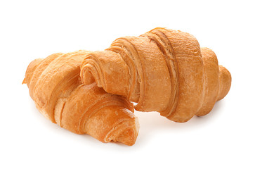 Tasty croissants on white background