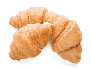 Tasty croissants on white background