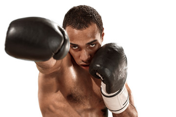 Sporty man during boxing exercise. Photo of boxer on white background