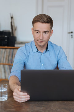 Businessman working from home using a laptop