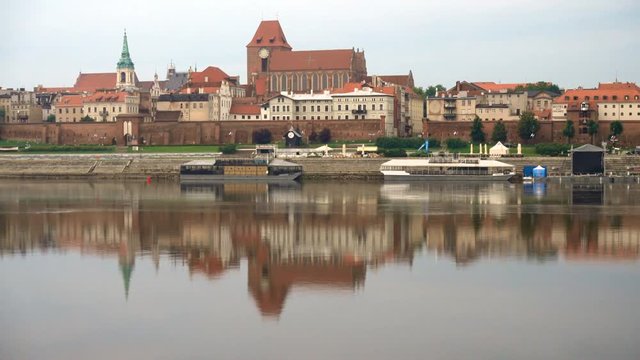 Torun old town panorama over Vistula river at sunrise time, Poland
