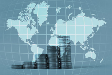 Savings, increasing columns of coins, piles of coins arranged as a graph, world map, global network business banking concept idea, element by NASA.