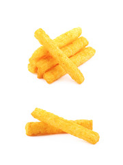 Pile of puffed cornmeal sticks isolated