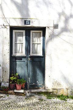 Green Entrance Door. Street Number Fifteen