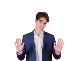 Studio portrait of teenage college student in suit. Portrait of elegant young man in suit, isolated on white background