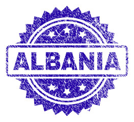 ALBANIA stamp watermark with corroded style. Blue vector rubber seal print of ALBANIA title with corroded texture.