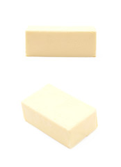 Slice block of butter isolated
