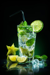 Mojito cocktail with fresh lime and mint