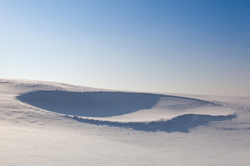 Golf bunker full of snow