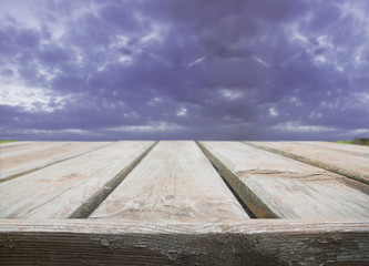 Empty wood table top on blur abstract background