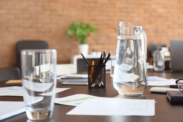Table prepared for business meeting in conference hall