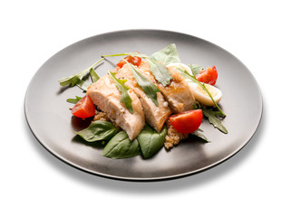 Plate with delicious chicken salad on white background