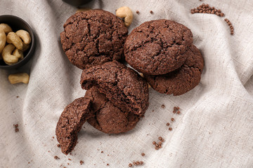 Delicious chocolate cookies on napkin