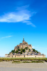 General view of the Mont Saint-Michel tidal island, located in France on the limit between Normandy...